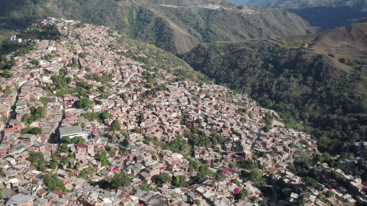 Aerial panoramic view of Petare in Miranda, Venezuela, showcasing the mountainous terrain