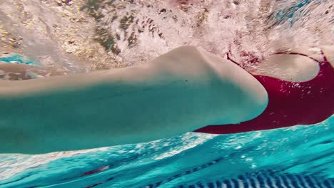 swimmer underwater in a pool