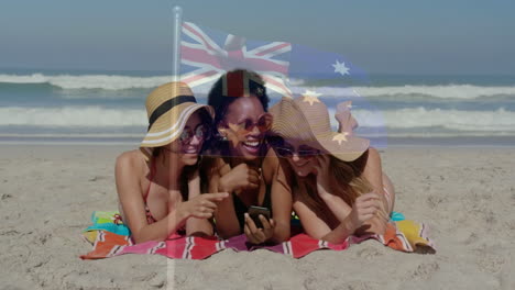 wearing sun hats, three women on beach with australian flag animation overlay