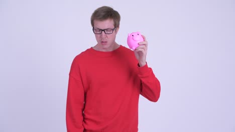 studio shot of young handsome man