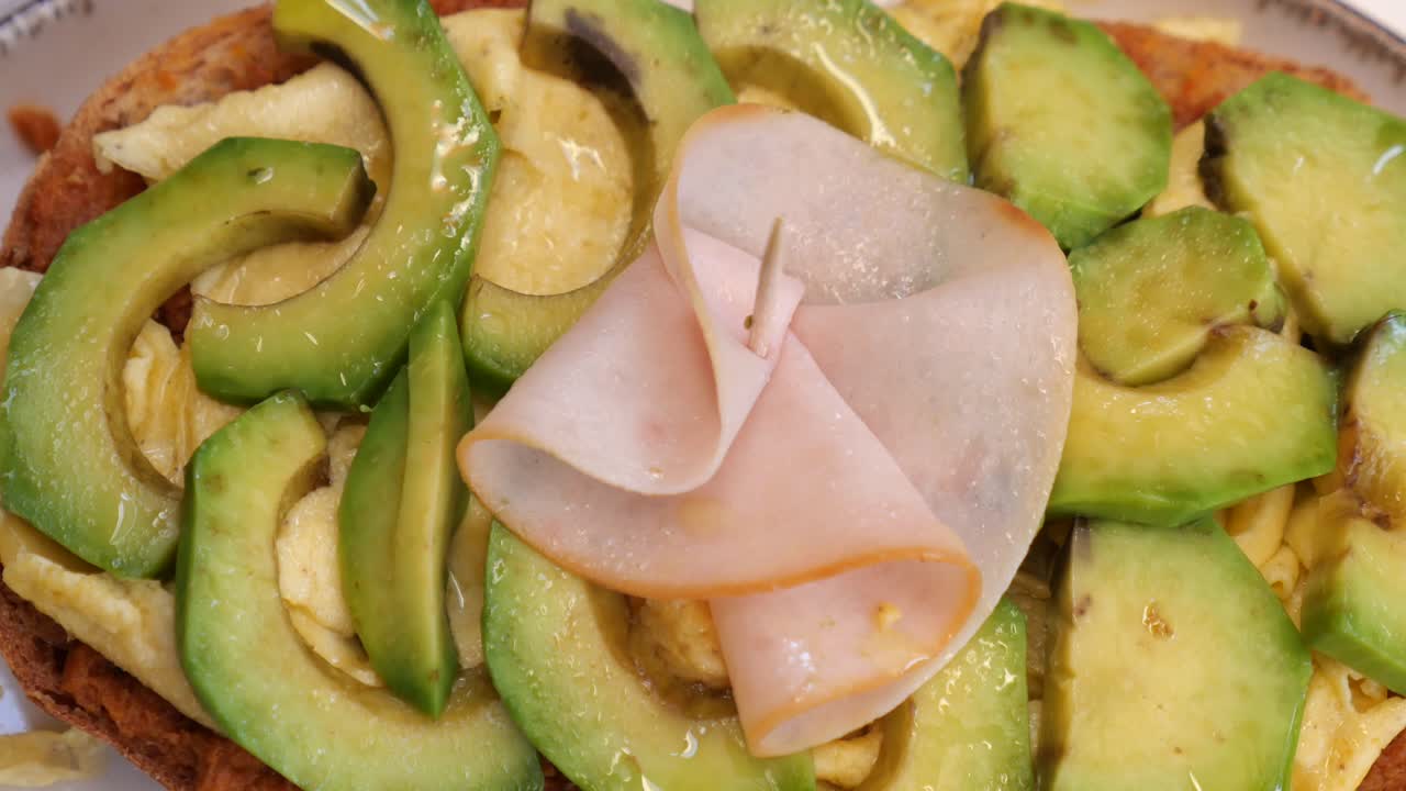 Avocado toast with ham and egg