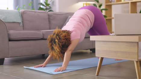 exercise, home and woman with yoga