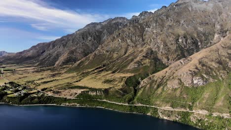 Scenery-of-high-mountains-and-lake,-New-Zealand-beautiful-landscape---aerial