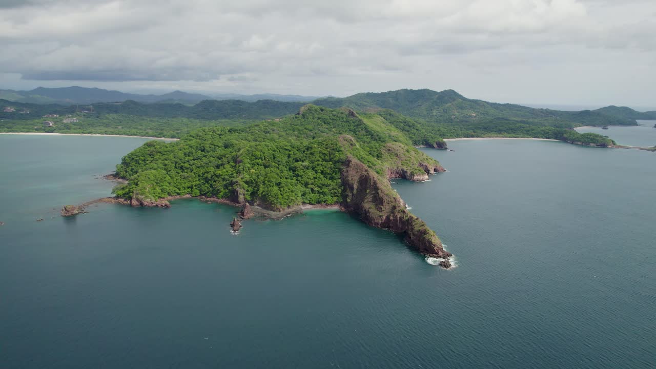 A 4K drone shot of Punta Sabana Point and the Mirador Conchal Peninsula next to Puerto Viejo and Playa Conchal, or &ldquo;Shell Beach&rdquo;, along the north-western coast of Costa Rica