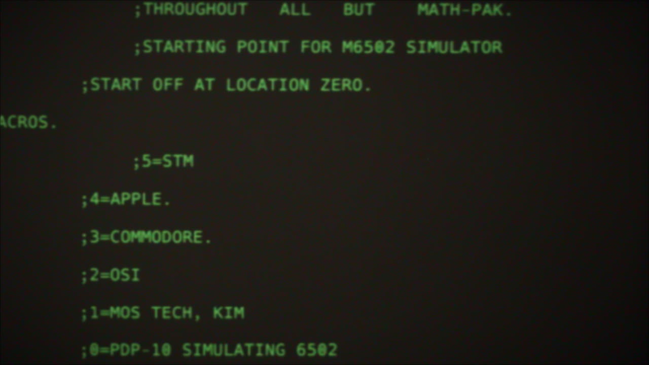 Vintage Computer Terminal Screen Displaying Code