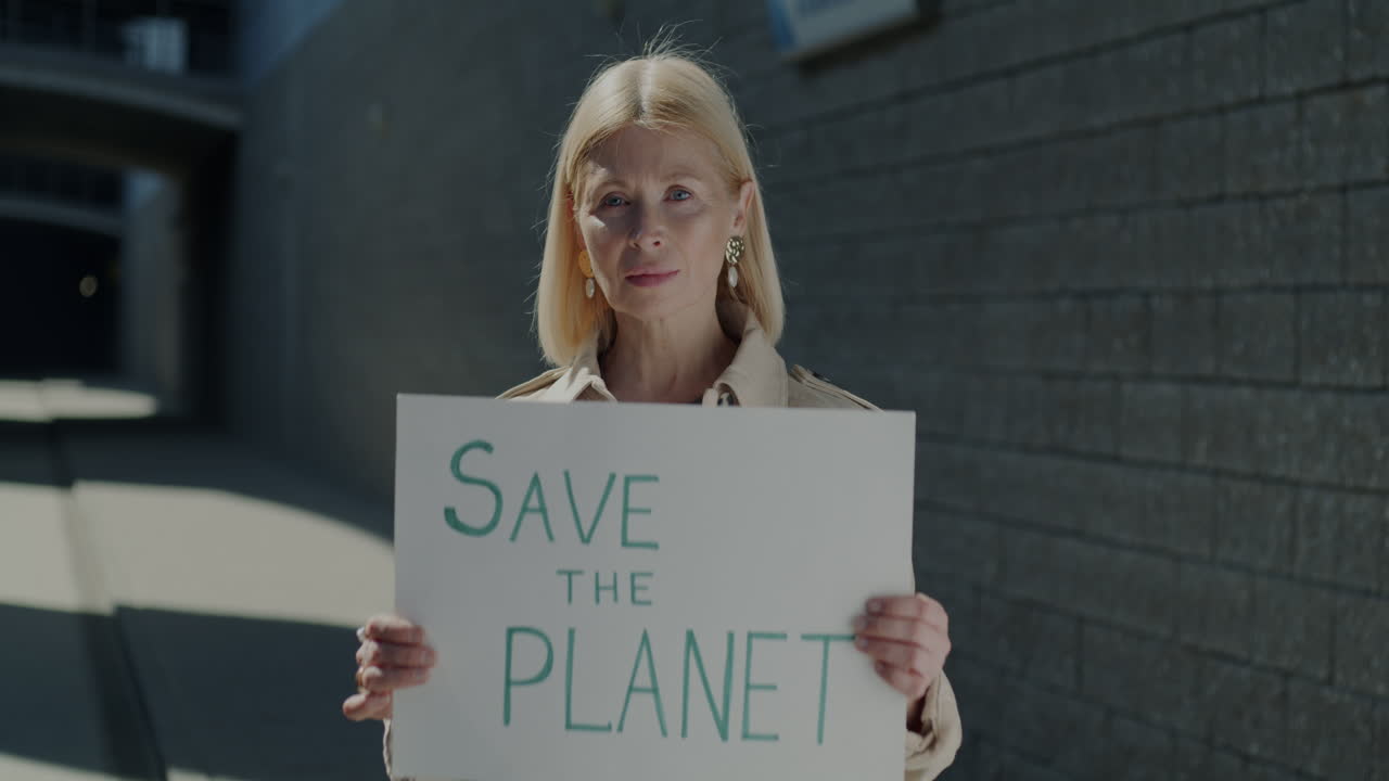 Senior Woman Protesting for Environmental Conservation