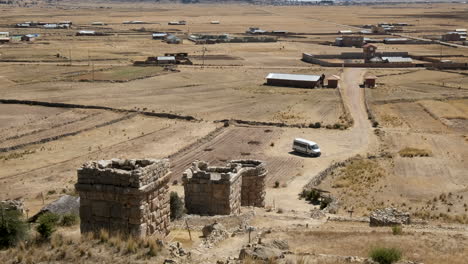 discover the expansive archaeological site of chullpas de molloco in peru, featuring ancient pre-inca burial towers set within a vast, rural andean landscape