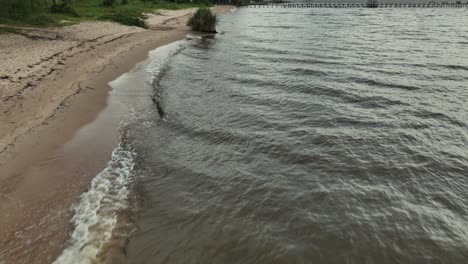 Aerial-reveal-over-Magnolia-Beach-in-Fairhope,-Alabama