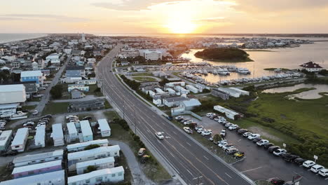 Cinematic-drone-shot-of-sun-setting-over-Atlantic-Beach-North-Carolina