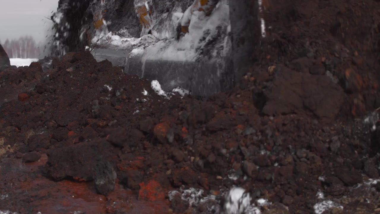 Volcanic eruption explosion and lava flow, in lava field with volcanic rock, with lava, volcanic rock, with igneous rock, molten lava texture, from a close-up perspective perspective.