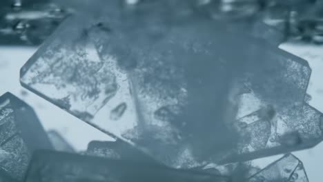 captivating underwater scenes of ice shards suspended in liquid, showcasing the subtle interplay of light and water, evoking a sense of refreshing tranquility