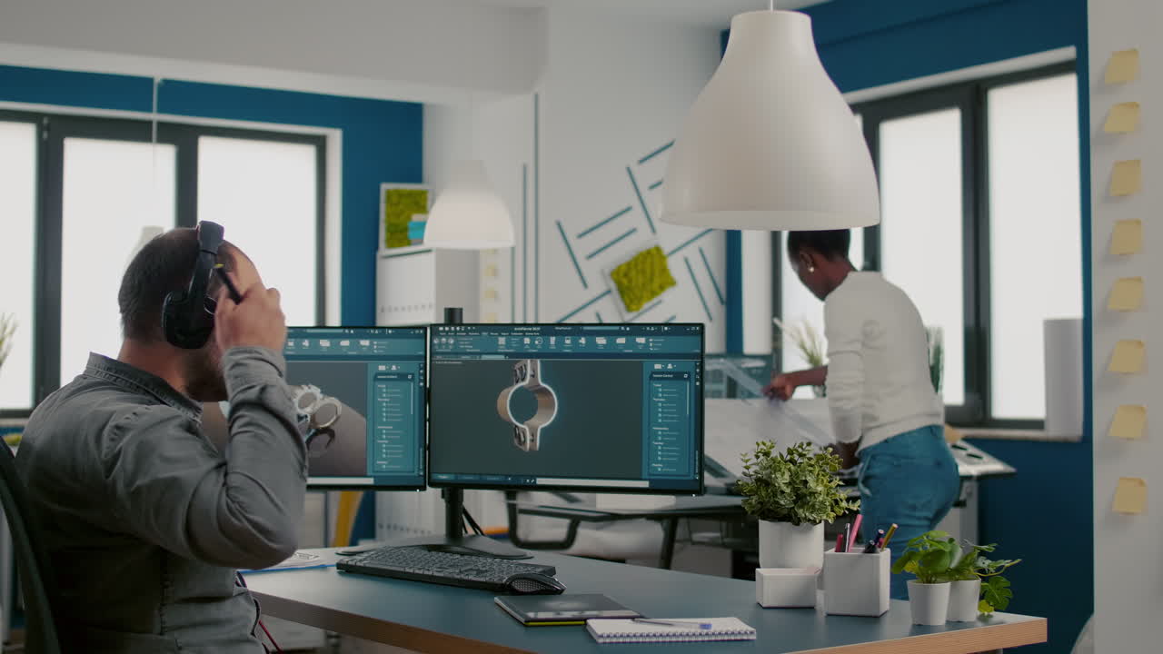 Mecanic technician working on cad software using computer