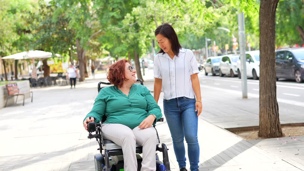 Woman in Wheelchair with Friend