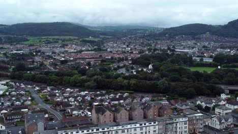 Old-Abergele-Pensarn-seaside-town-North-Wales-mountain-skyline-aerial-view-right-pan