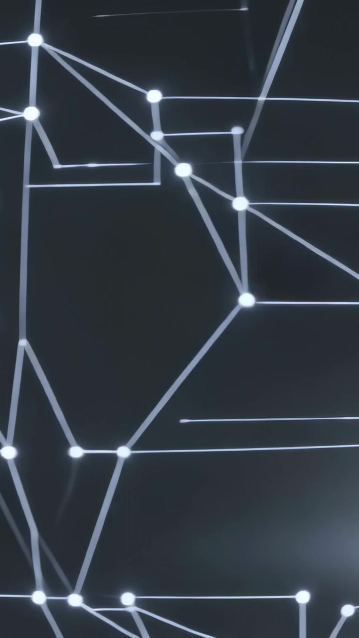 Video verticale: Bagliore che sale in basso a sinistra, animando una rete di nodi e linee che si spostano su uno schermo scuro.