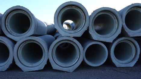 motion along concrete pipes to install at construction site