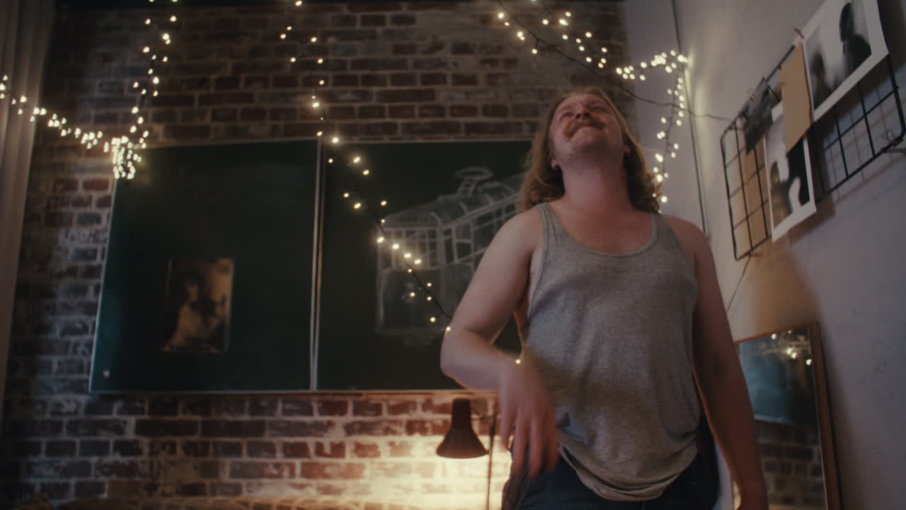 Man in a Cozy Room at Night