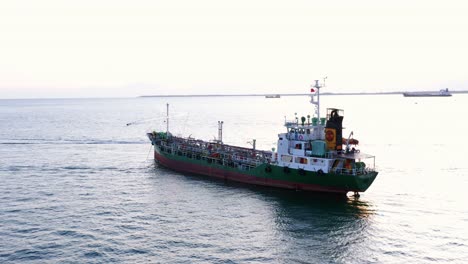 big oil tanker ship over the ocean near port of balikpapan in kalimantan, indonesia