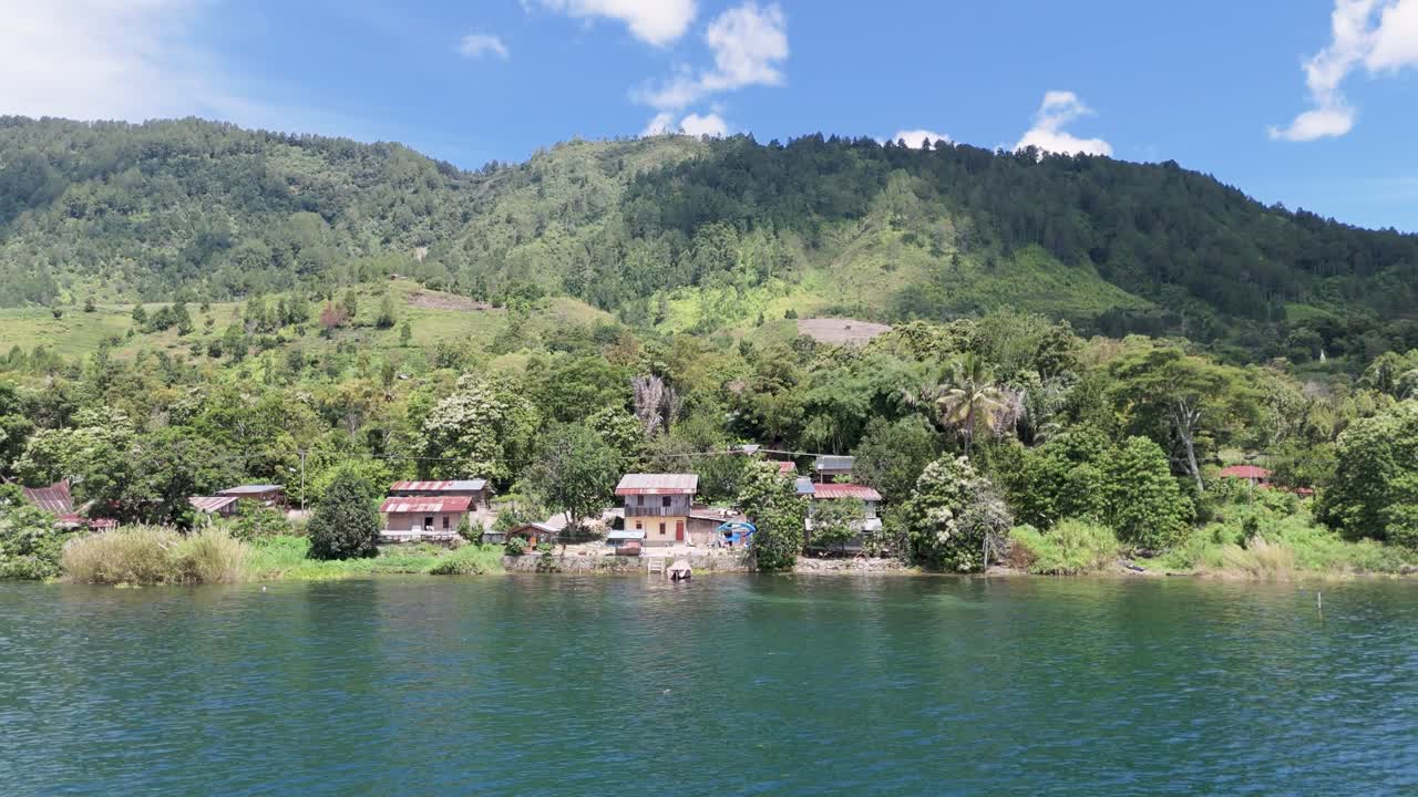 Wide aerial perspective of Lake Toba near Balige, North Sumatra