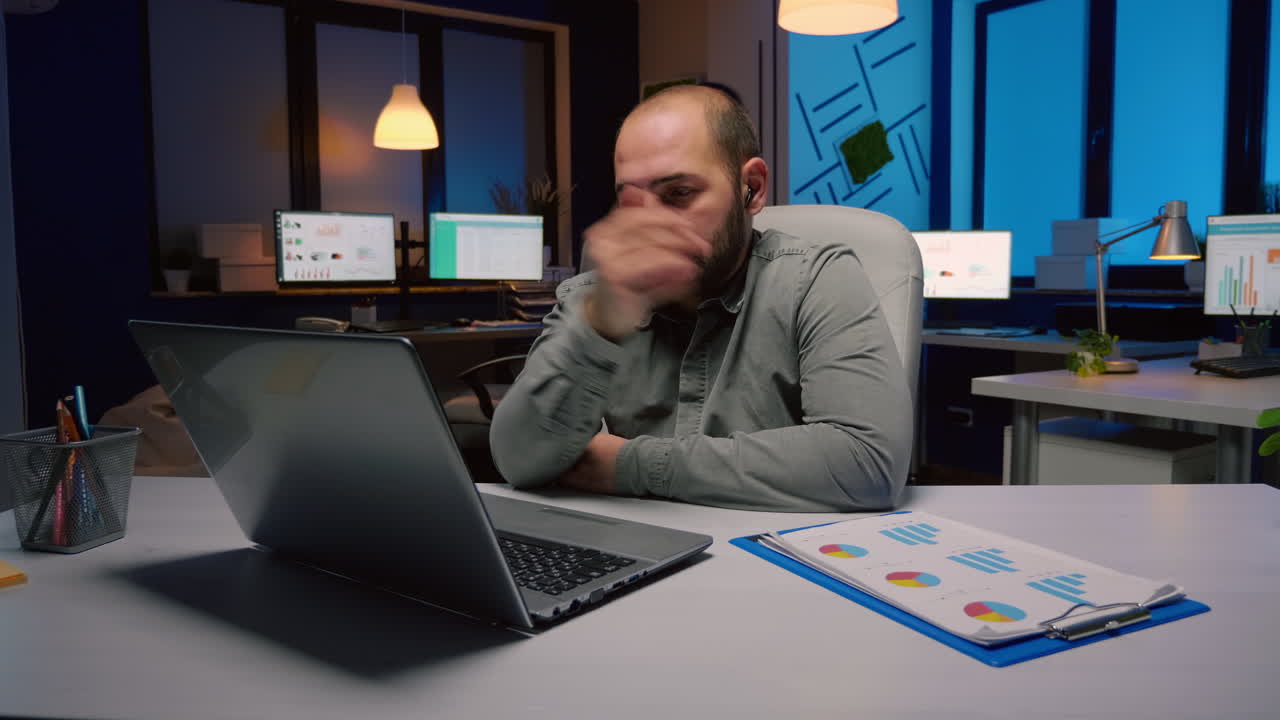 Exhausted businessman discussing marketing deadline project with remote employee