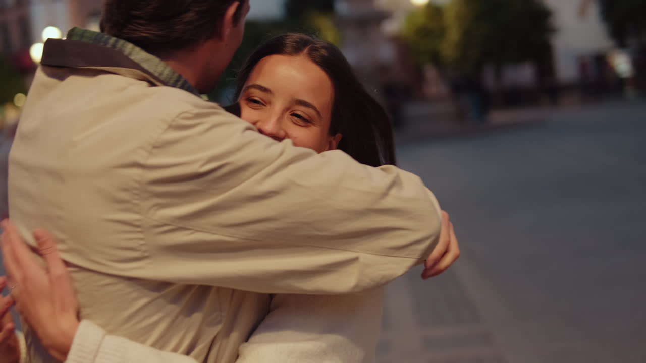 Couple's Romantic Embrace in Seville