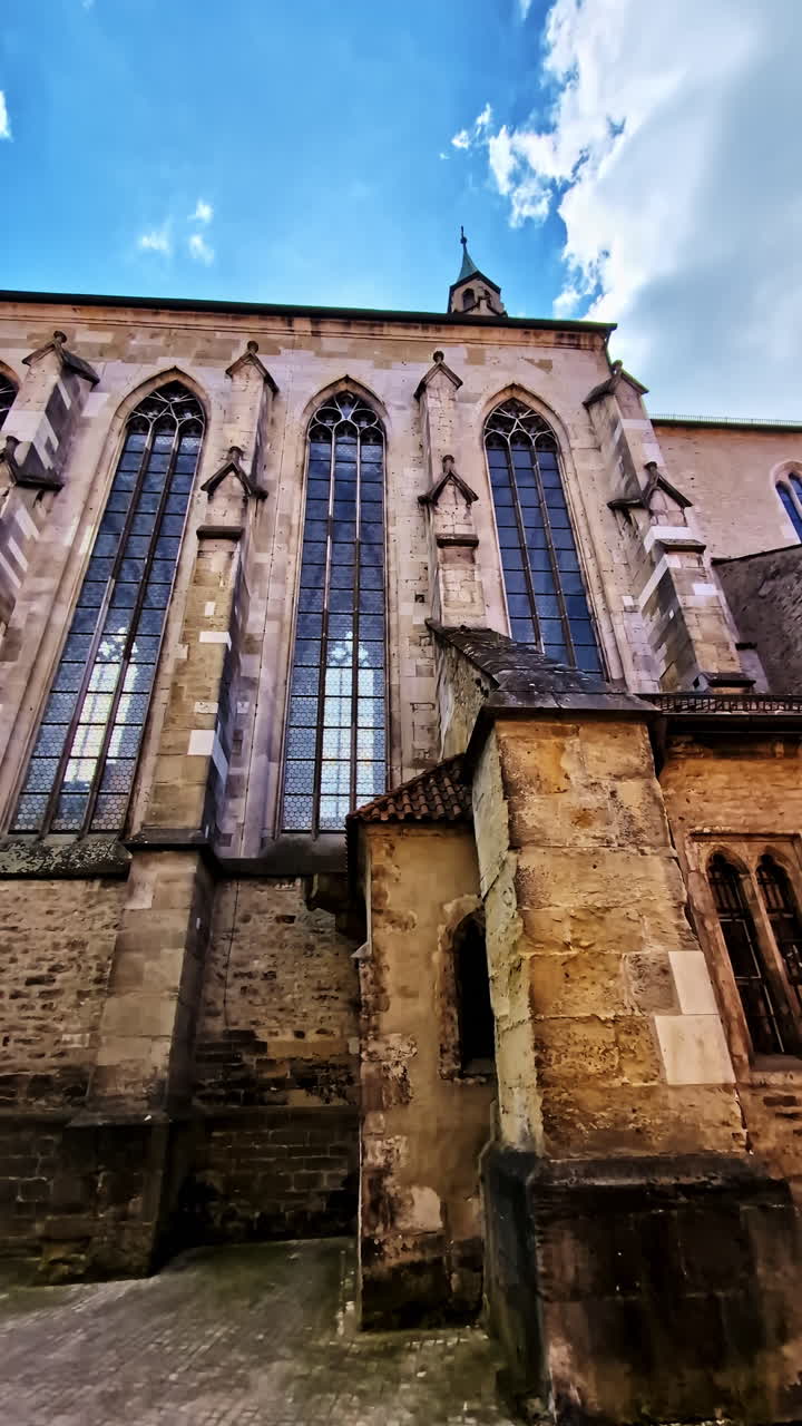 Tall Gothic Windows of Former Minorite Church of St. Salvator in Regensburg. Vertical upwards shot