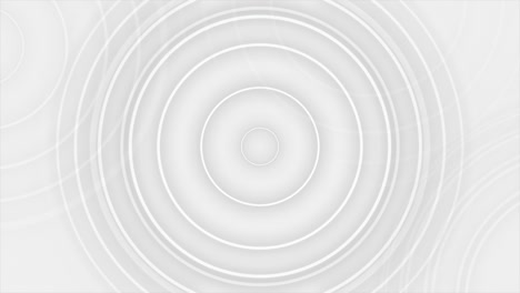 white circular waves radiating outward create minimal elegant pattern footage enhances modern design