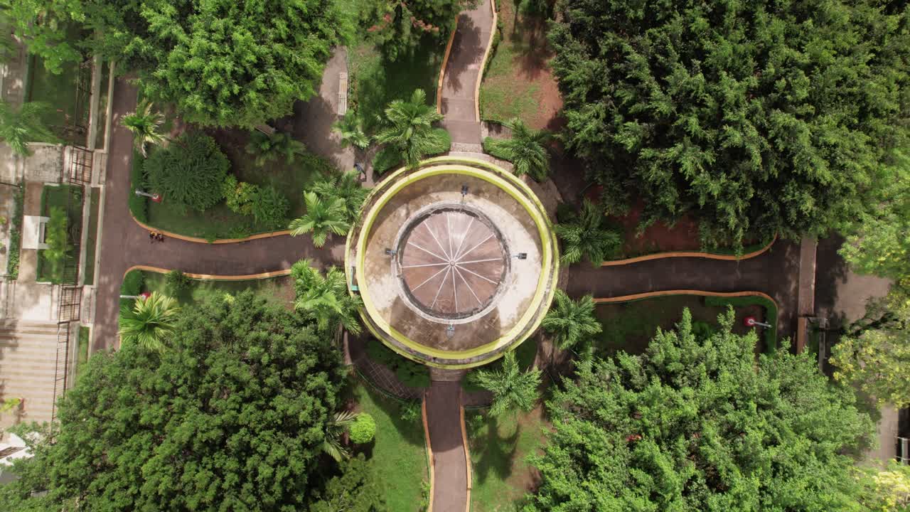 Rotating Rising Aerial Top View over Yamasa Central Park, Dominican Republic