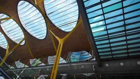 orbital shot of the interior of terminal 4 international arrivals at madrid-barajas airport