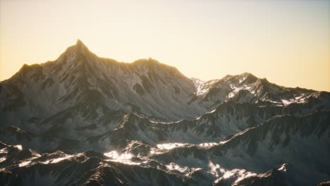 aerial view of the alps mountains in snow