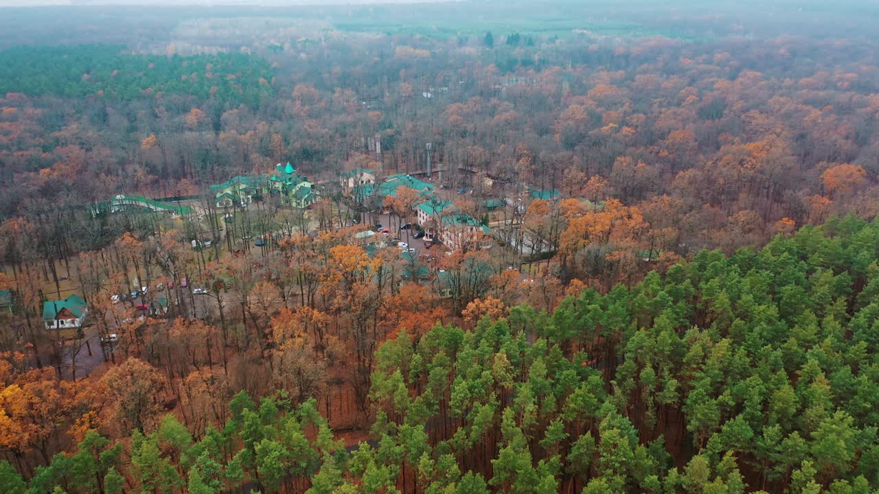 Beautiful relaxation area. Aerial drone view of forest ladnscape with complex area