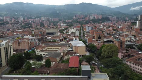 aerial drone pushes in on envigado town, columbia, south america