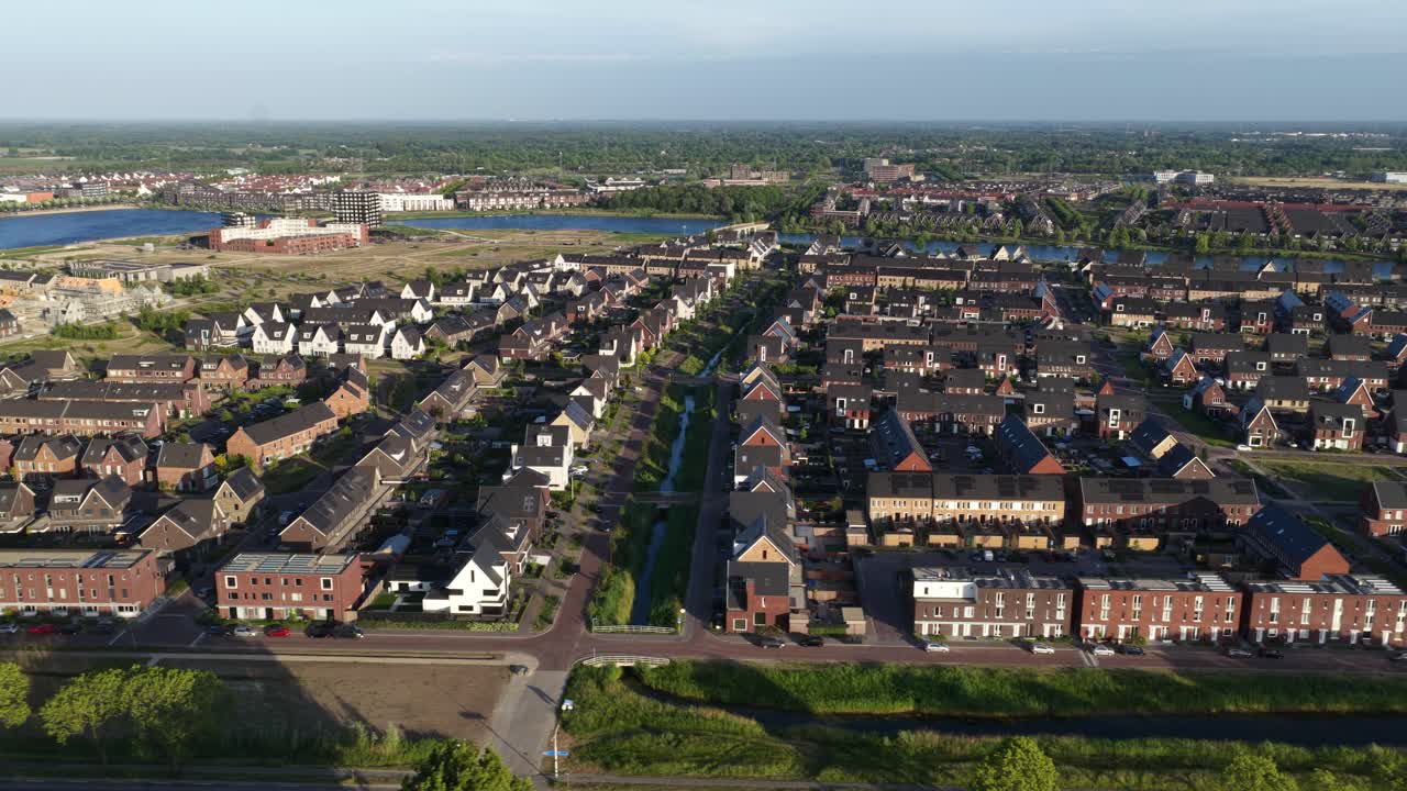 housing shortage in The Netherlands, new build housing, residential areas. real estate. Aerial video