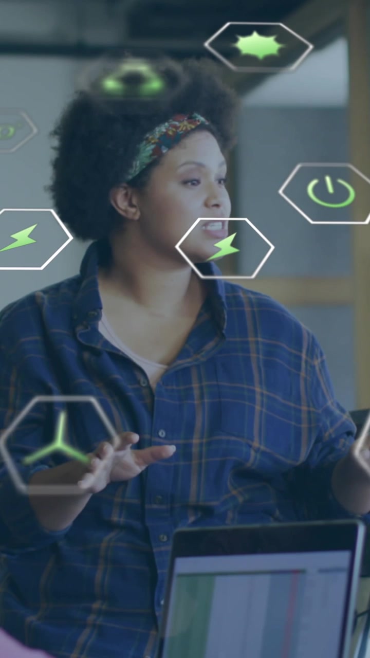 Animation of data processing and icons over business people in office