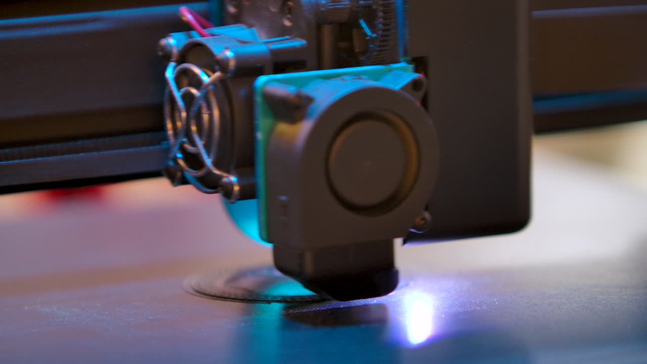 Closeup of a 3D printing machine at work