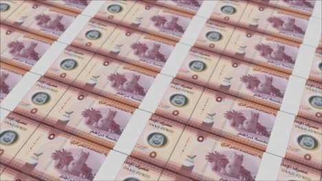 5 united arab emirates dirham banknotes printed by a money press