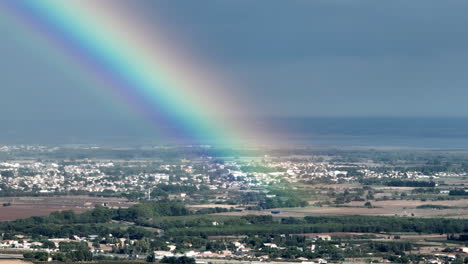 Montpellier's-picturesque-aerial-vista-includes-vineyards,-glimpses-of-the-Med