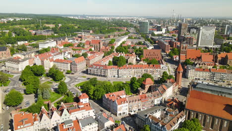 Aerial-View-Of-Gdansk-Old-Town-During-Sunny-Day-In-Poland---drone-shot