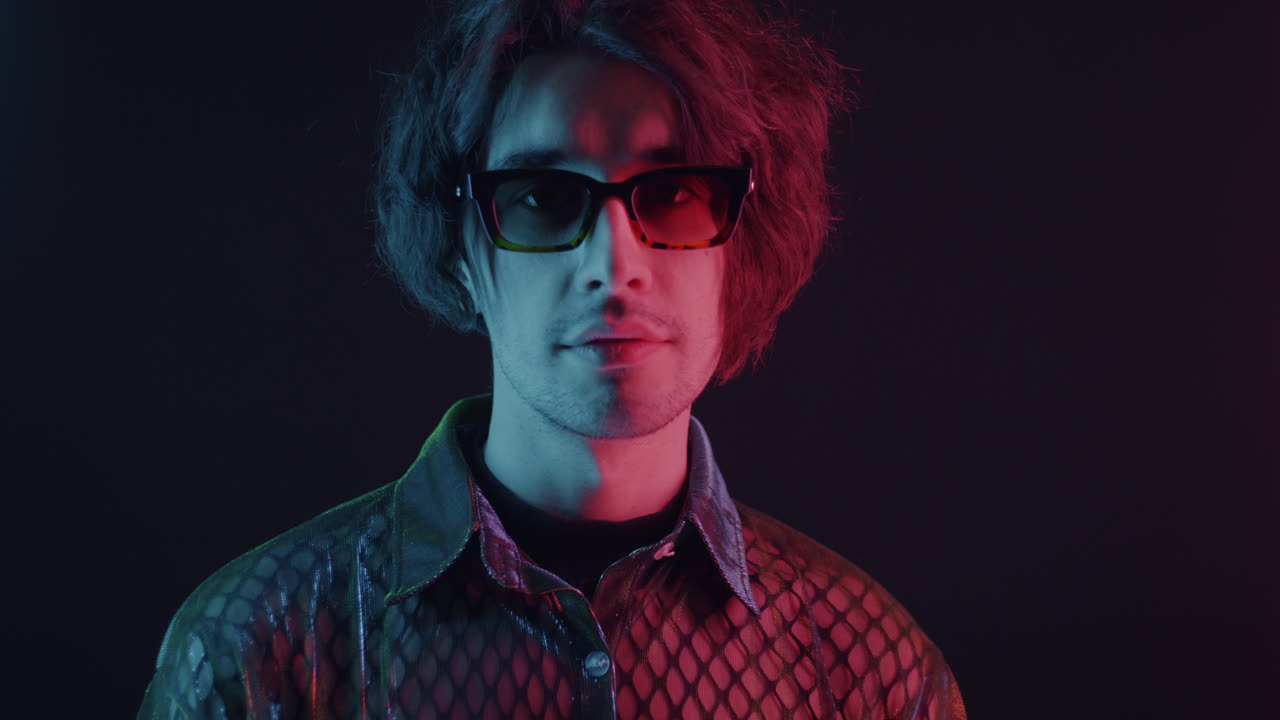 Stylish Man in Neon Lighting