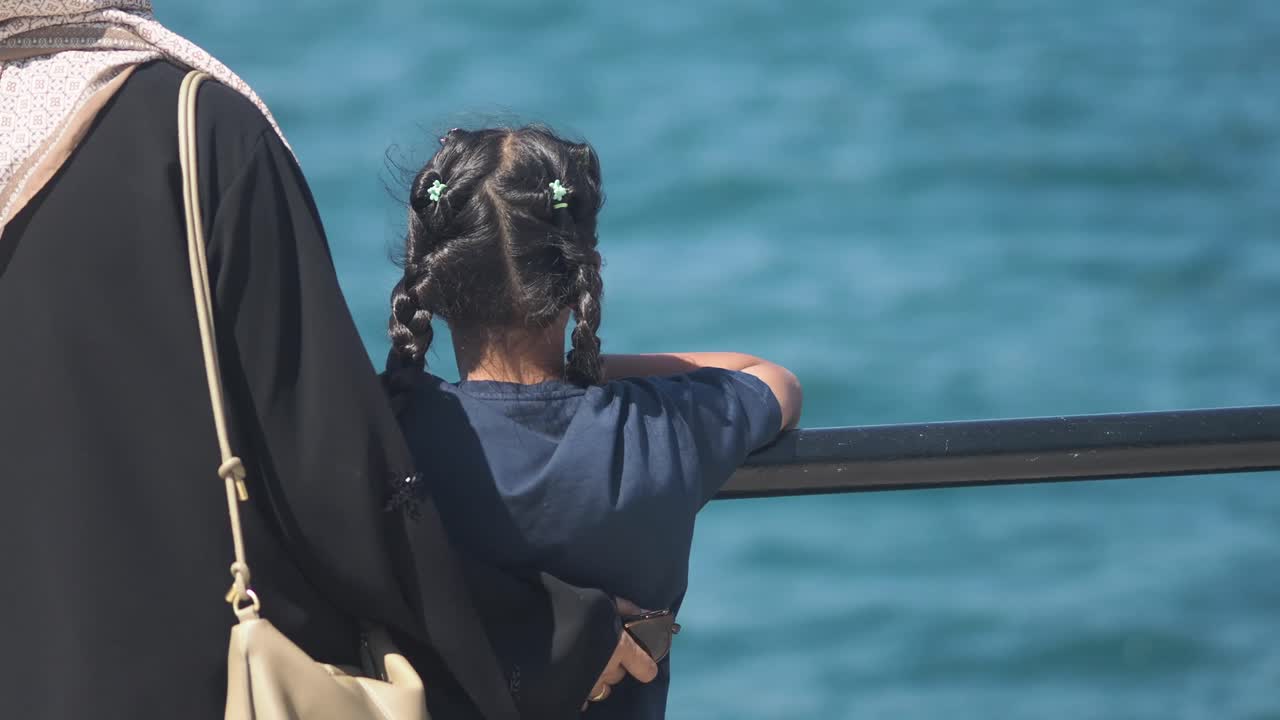 Mother and Daughter by the Sea