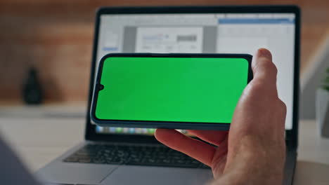 startuper finger touching mockup smartphone table closeup. man pressing display