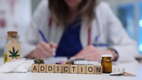 concept of drug addiction with various substances and medical professional in background