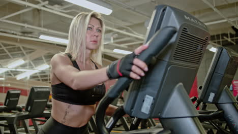 muscular athlete actively training in the modern gym