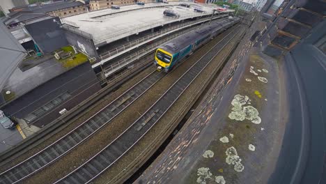 Train-travelling-past-on-tracks-bellow-window-1