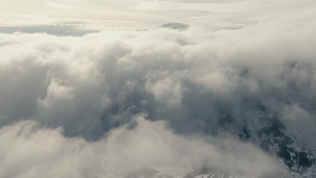 Clouds Over Mountain Peak In Lofoten Norway - Drone Shot