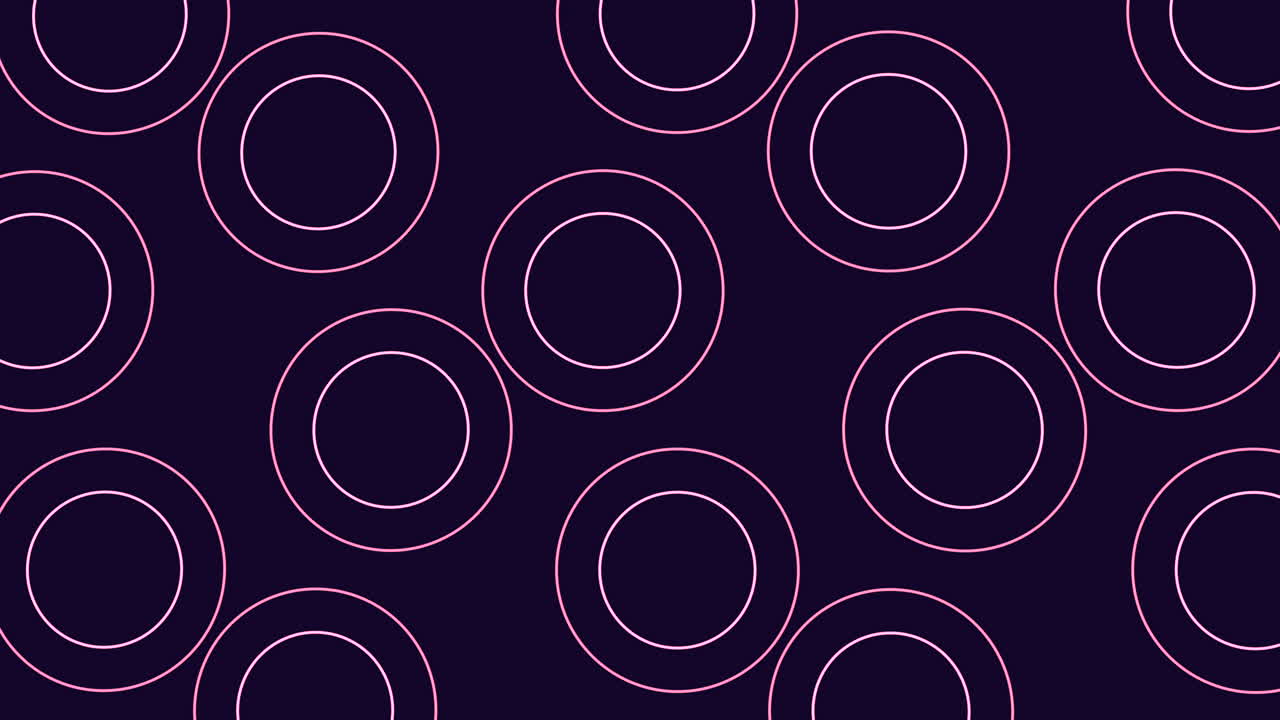 A visually striking image featuring a circular pattern of blue and white circles on a dark background. The circles overlap with white outlines, creating a harmonious and creative design