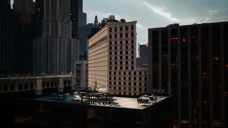 cityscape of skyscrapers with a view of the sunset