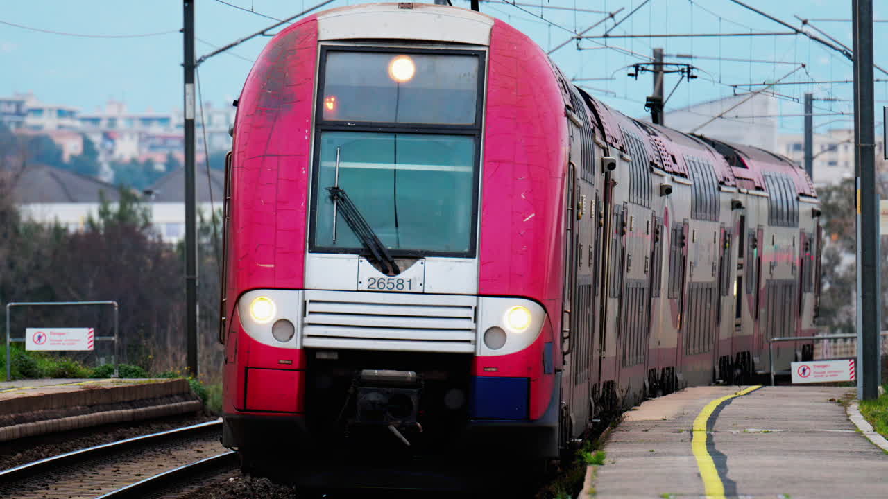 Nice, France - February 4, 2025: Trains moving on the rails in the Nice Ville Central train station