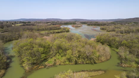 Aerial-rising-shot-of-the-murky-waters-in-the-Middle-Fork-White-River