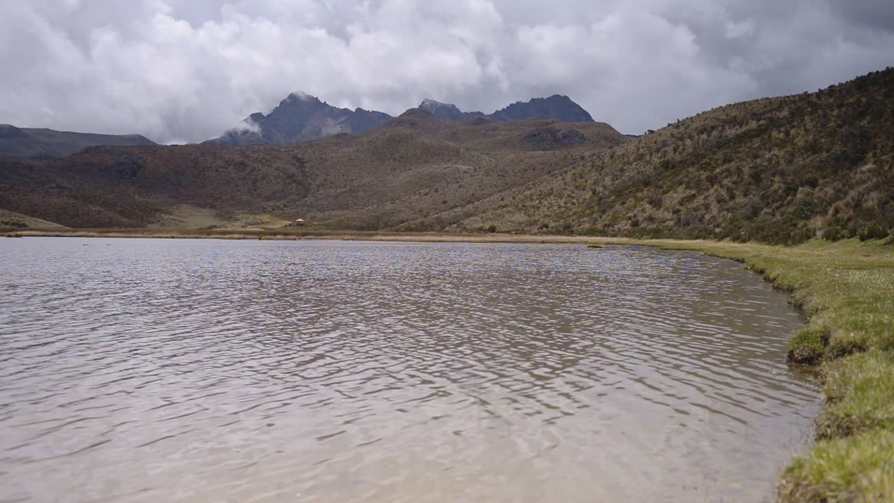Landscape view of Ruminawi Volcano and Lake Limpiopungo, Ecuador, on a cloudy day